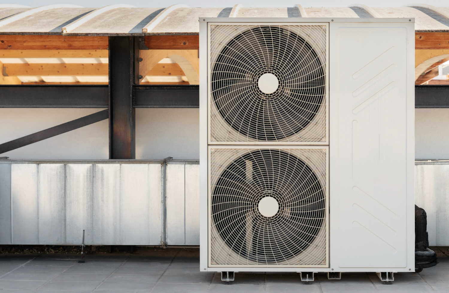 Technician performing seasonal HVAC maintenance on a residential air conditioning system in Florida