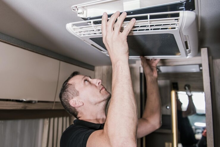 Should You Repair or Replace Your AC? A Boynton Beach Homeowner's Guide 6 imgi 40 rv appliances technician work 1426 7913
