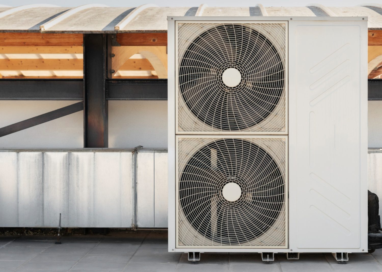 Technician performing seasonal HVAC maintenance on a residential air conditioning system in Florida